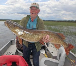 
Dan Johnson with Huge pike on Wollaston Lake