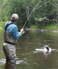 Tim with a jumping smallie on the line